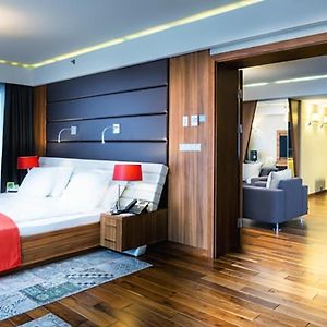 Suite met een Slaapkamer en een King Size Bed